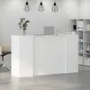 A white reception desk in an office setting with a laptop and a plant on top. Produktbild-Vorschau