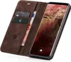 A brown leather flip case for a Samsung Galaxy S9+ phone, shown open with the phone displaying its screen and the case holding cards and cash. Produktbild-Vorschau