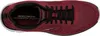 A top-down view of a burgundy and black athletic shoe. Produktbild-Vorschau