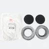 A product shot of headphone ear pads and foam inserts, with packaging on the left. Podgląd zdjęcia produktu