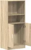 A tall, narrow cabinet with two shelves and two doors, shown against a white background. Náhled obrázku produktu