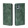 A green flip case for a smartphone is shown from two angles against a white background. Produktbild-Vorschau