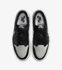 A top-down view of a pair of Nike Jordan 1 Low OG "Shadow" sneakers. Produktbild-Vorschau