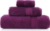 Three stacked towels of varying sizes. Podgląd zdjęcia produktu