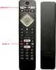 A black TV remote control with labels pointing to specific buttons. Produktbild-Vorschau