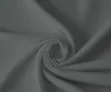 A close-up shot of a folded grey fabric, likely a bedsheet, with a swirl pattern. Produktbild-Vorschau
