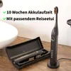 A black electric toothbrush and its travel case are displayed on a wooden surface next to a white sink. Produktbild-Vorschau