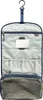 An open, hanging toiletry bag with multiple compartments and a mirror. Produktbild-Vorschau
