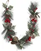 A Christmas garland made of pine branches, pine cones, red berries, and red ornaments. Náhled obrázku produktu
