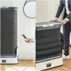 A split image showing a TEFAL steam cabinet. The left side shows the cabinet in its upright, expanded state with a remote control in hand. The right side shows the cabinet in a more compact, folded state with a person in a suit interacting with it. Produktbild-Vorschau