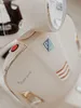 Elektrische Vespa-scooter met een witte Sun Baby bagagebox Productafbeelding-voorbeeld 10