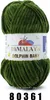 A ball of green yarn with a label. Anteprima dell’immagine prodotto