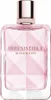 A close-up, front-facing studio shot of a Givenchy Irresistible Very Floral Eau de Parfum bottle. Voir les images du produit