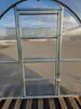 Close-up view of a greenhouse door frame and transparent panels. Produktbild-Vorschau