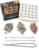 A Halloween-themed DIY jewelry making kit with charms, beads, and bracelets, laid out on a white background. Produktbild-Vorschau