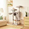 A cat tree with two cats in a living room setting, next to a sofa and a dresser. Anteprima dell’immagine prodotto