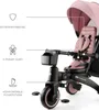 Close-up view of a pink and black Kinderkraft Jazz 2 foldable trike, with labels pointing out features. Voir les images du produit