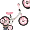 A child is holding a balance bike. Náhled obrázku produktu