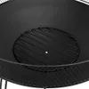 Close-up view of the interior of a black metal fire pit, showing a circular grate inside. Náhľad obrázku produktu