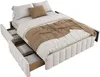 A bed with storage drawers pulled out, showing bedding and pillows. Podgląd zdjęcia produktu