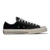A black Converse Chuck 70 low-top sneaker is shown from the side against a white background. Anteprima dell’immagine prodotto