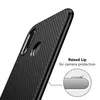 A close-up view of a black carbon fiber textured phone case, highlighting the raised lip around the camera. Produktbild-Vorschau