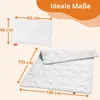 Image shows a pillow and a folded duvet with dimensions indicated by arrows and text. Voir les images du produit