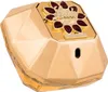 A gold-colored perfume bottle with a decorative top. Voir les images du produit