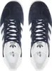 A top-down view of a pair of navy blue Adidas Gazelle sneakers. Produktbild-Vorschau