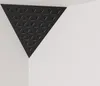 A black triangular acoustic foam panel with a geometric pattern is mounted in the corner of a white room. Podgląd zdjęcia produktu