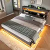 A modern bedroom with a bed, nightstand, and clock. Produktbild-Vorschau