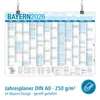 A calendar poster hanging from clips, showing a yearly planner for Bayern 2026. Produktbild-Vorschau