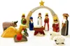 A wooden nativity scene with figures and animals. Produktbild-Vorschau