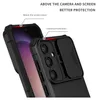 Close-up view of a black phone case with a sliding camera cover, highlighting its protective features. Produktbild-Vorschau