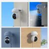 A collage of four images showing a white Reolink E1 Outdoor Pro security camera mounted on different surfaces and in different lighting conditions. Produktbild-Vorschau