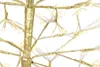 A close-up view of a gold metallic Christmas tree with small lights. Voir les images du produit