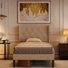 A bedroom scene with a bed, nightstand, and artwork. Náhled obrázku produktu