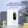A white dehumidifier is placed on a table next to a glass candle and a vase of flowers, with text overlaying the background. Produktbild-Vorschau