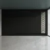 A top-down view of a modern black shower tray with a silver drain. Produktbild-Vorschau