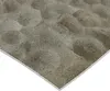 A close-up, angled view of textured sand. Náhled obrázku produktu