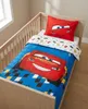 Ambiente Aufnahme vom Cars Babybettwäsche Set Lightning McQueen 100x140 cm 100% Baumwolle in einem Babybett. Productafbeelding-voorbeeld