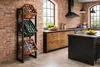 A kitchen with a brick wall and industrial-style cabinets and appliances. Produktbild-Vorschau