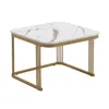 A white and gold coffee table with a marble-like top, presented on a white background. Voir les images du produit