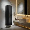 A modern bathroom with a black tall cabinet, a sink, and a mirror. Produktbild-Vorschau