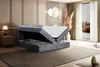 A bedroom scene with a bed that has its storage compartment open. Produktbild-Vorschau