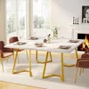 A dining table set in a well-lit room with a fireplace and large windows. Produktbild-Vorschau