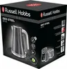 The image shows the retail packaging for a Russell Hobbs Geo Steel kettle. The box is black with the product name and branding prominently displayed. There are also images of the kettle and other Russell Hobbs products on the box. Anteprima dell’immagine prodotto