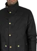 Close-up of a person wearing a black jacket. Produktbild-Vorschau