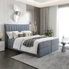 A bedroom with a large bed. Produktbild-Vorschau