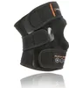 A black knee brace with orange accents and branding, shown against a white background. Náhled obrázku produktu